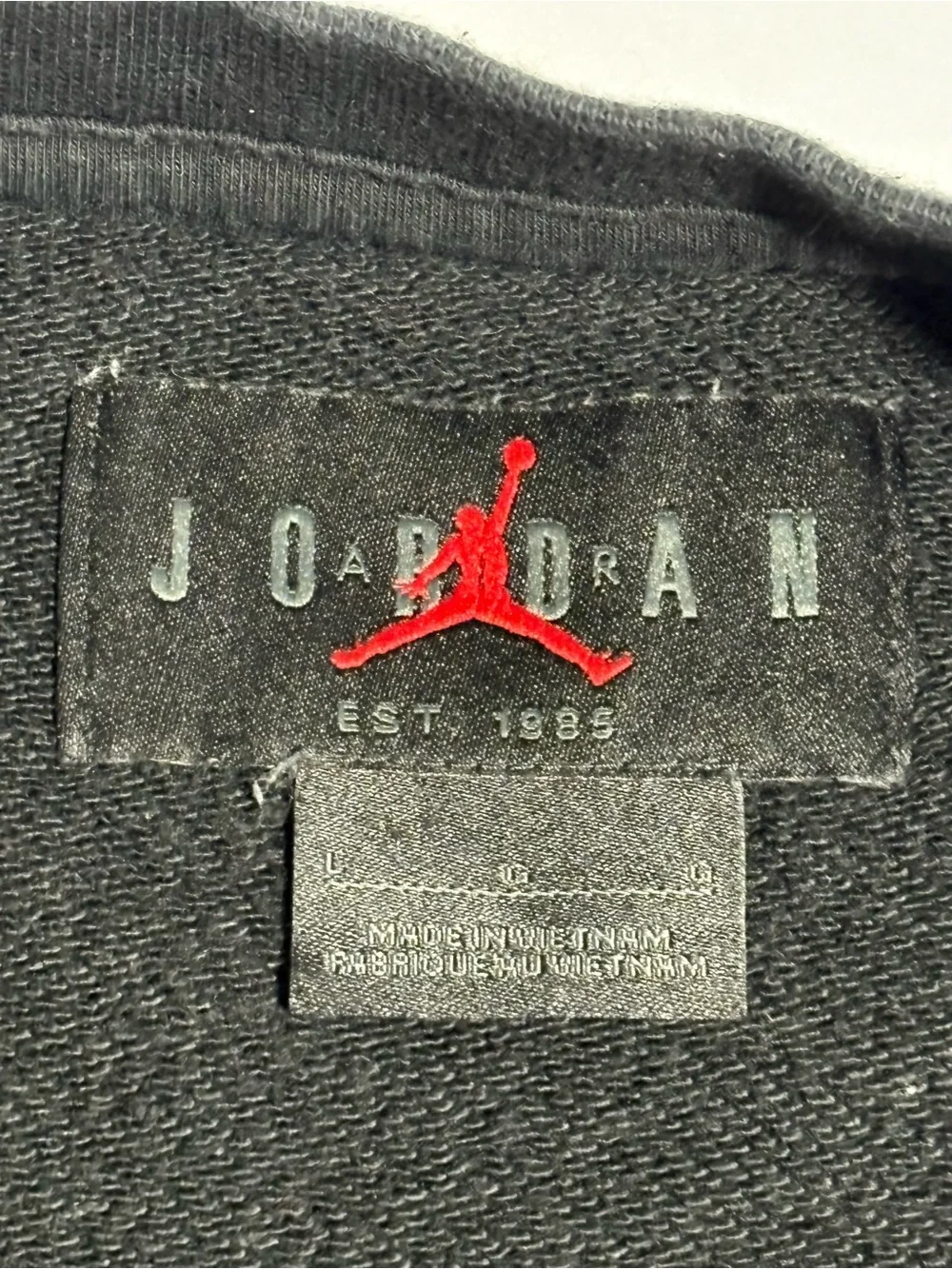 Jordan Black Crewneck Sweater with Gold Accents